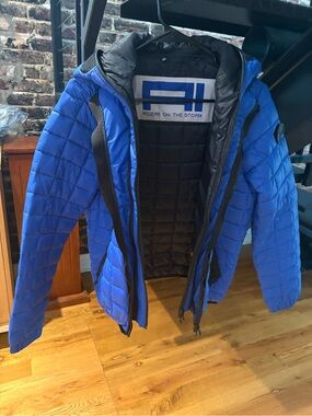 AI Riders On The Storm Men's Blue Quilted Ski Jacket w/integrated goggles & hood